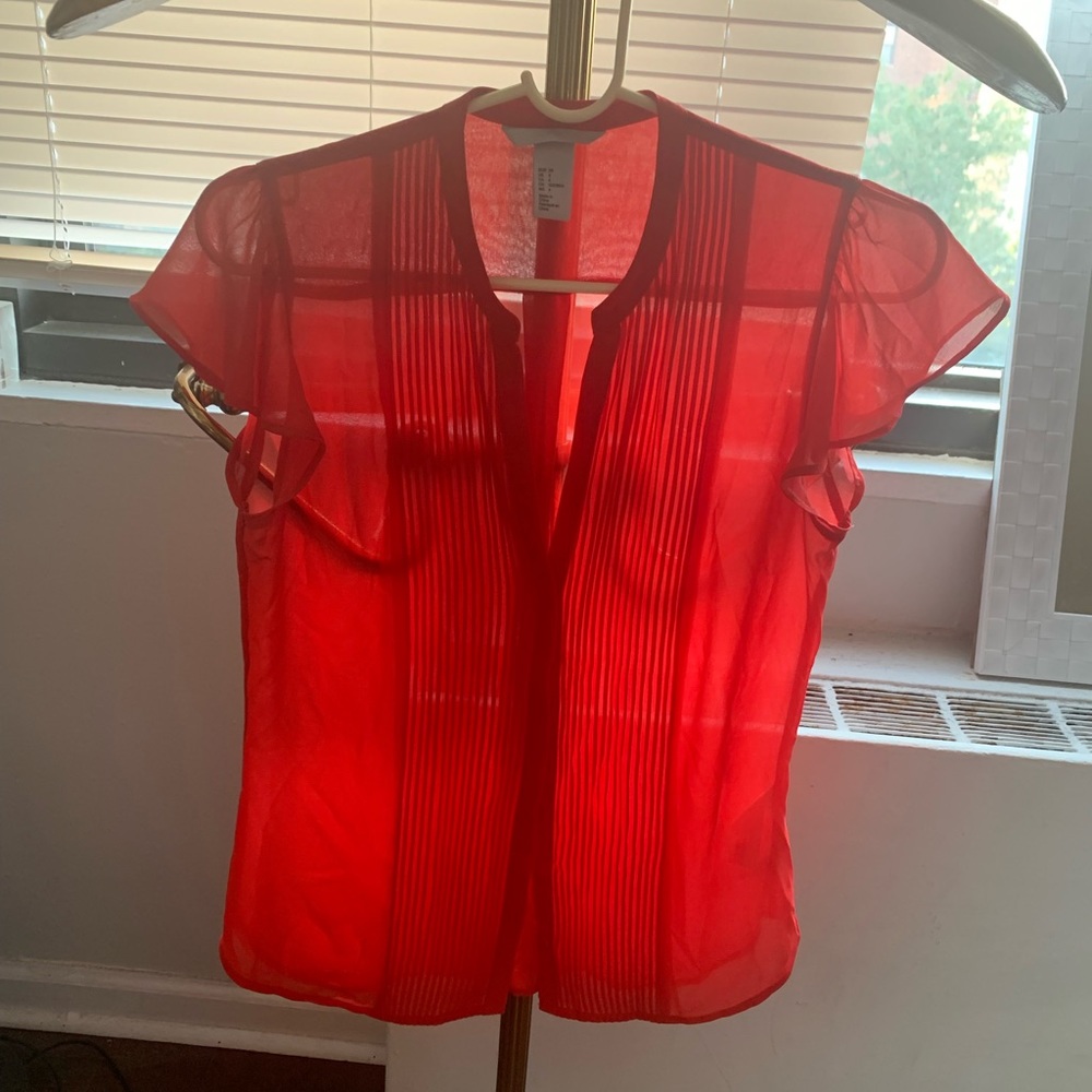 Semi sheer red top with pleating detail